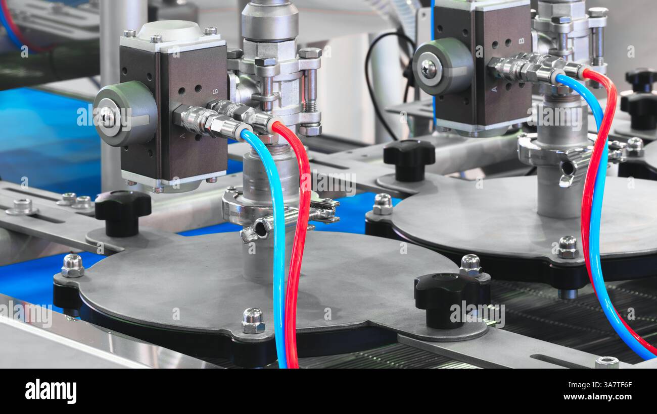 Blue For Machine Two machines with red and blue tubes attached to them. The tubes are ...