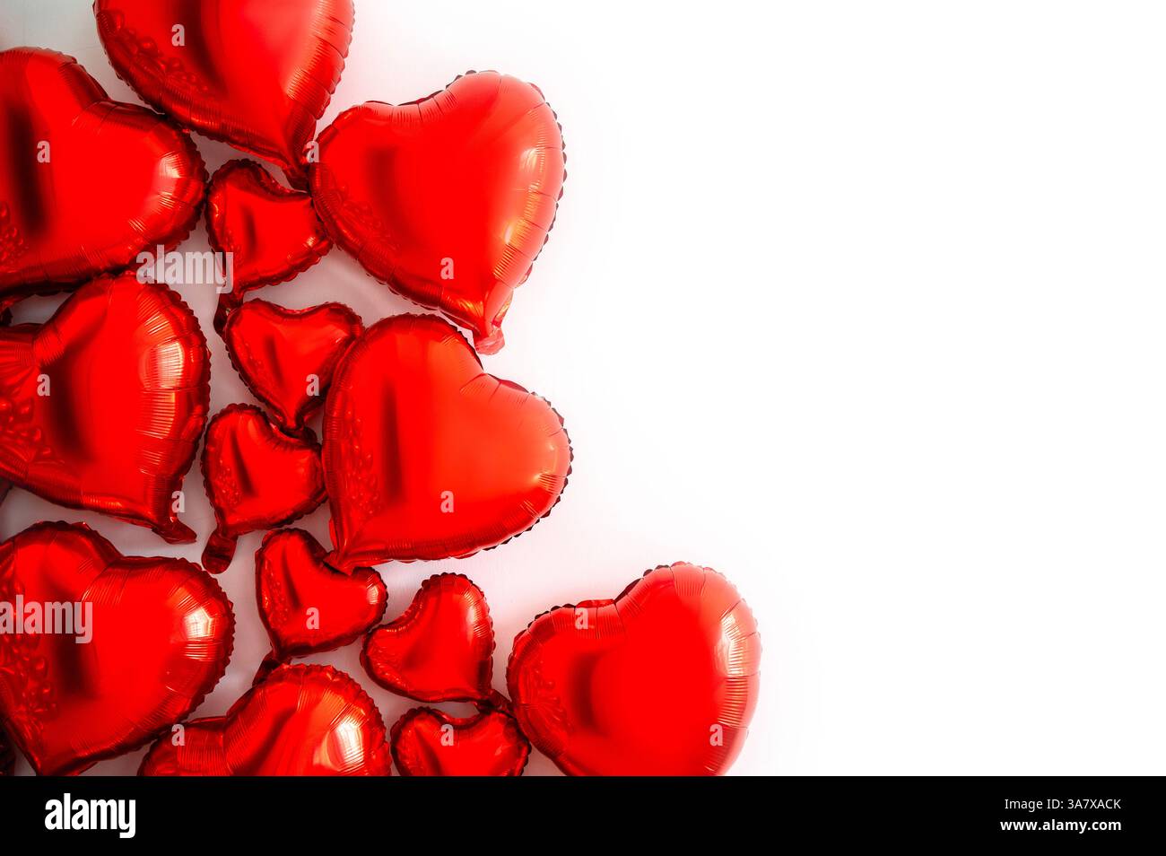 A set of red heart-shaped balloons on a white background Stock Photo ...