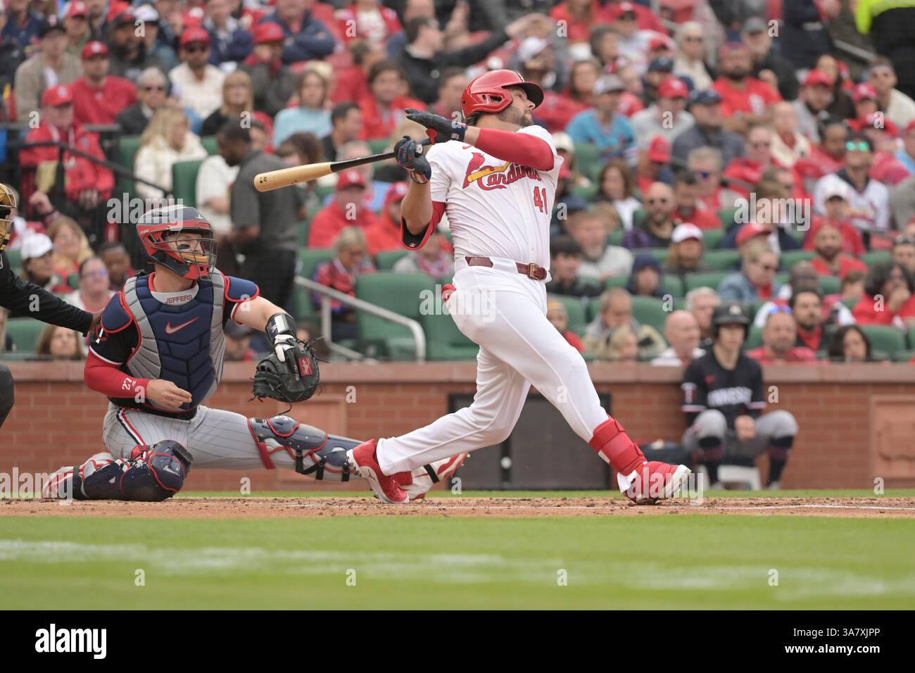 St. Louis Cardinals' Alec Burleson (41) hits a single during the first