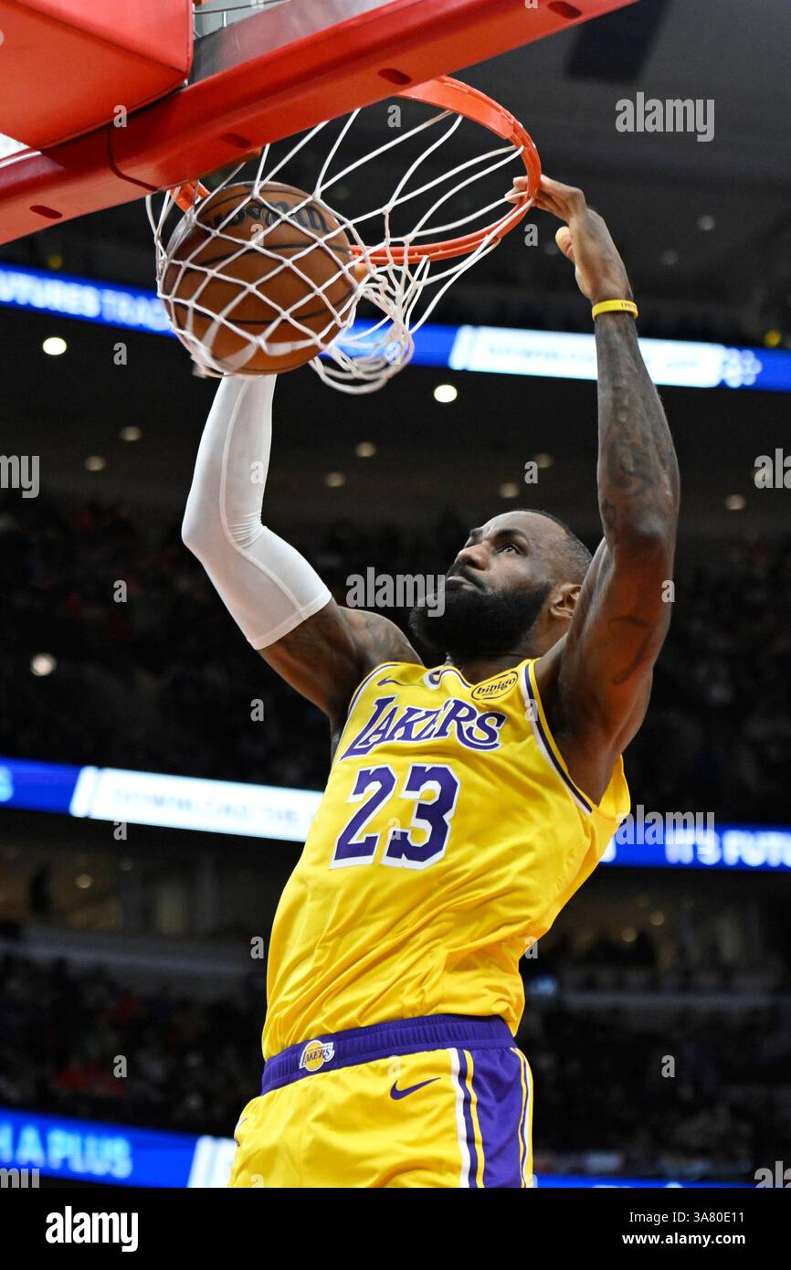 Los Angeles Lakers' LeBron James dunks during the first half of an NBA ...