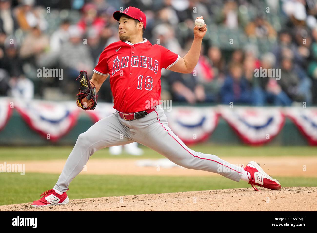 Los Angeles Angels starting pitcher Yusei Kikuchi (16) makes a pitch during MLB Opening Day game