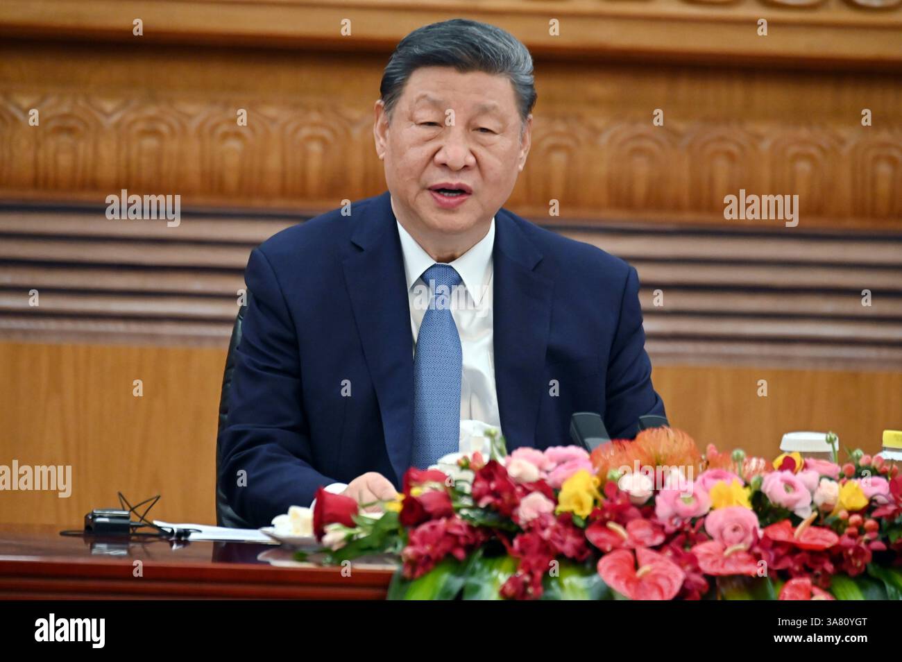 Peking, China. 28th Mar, 2025. Xi Jinping, President of China, speaks to CEOs of global companies. Xi praised China as a safe investment location. In the Great Hall of the People in Beijing, the President and Chairman of the Communist Party received company bosses from Siemens, Mercedes-Benz and BMW, among others. Credit: Johannes Neudecker/dpa/Alamy Live News Stock Photo
