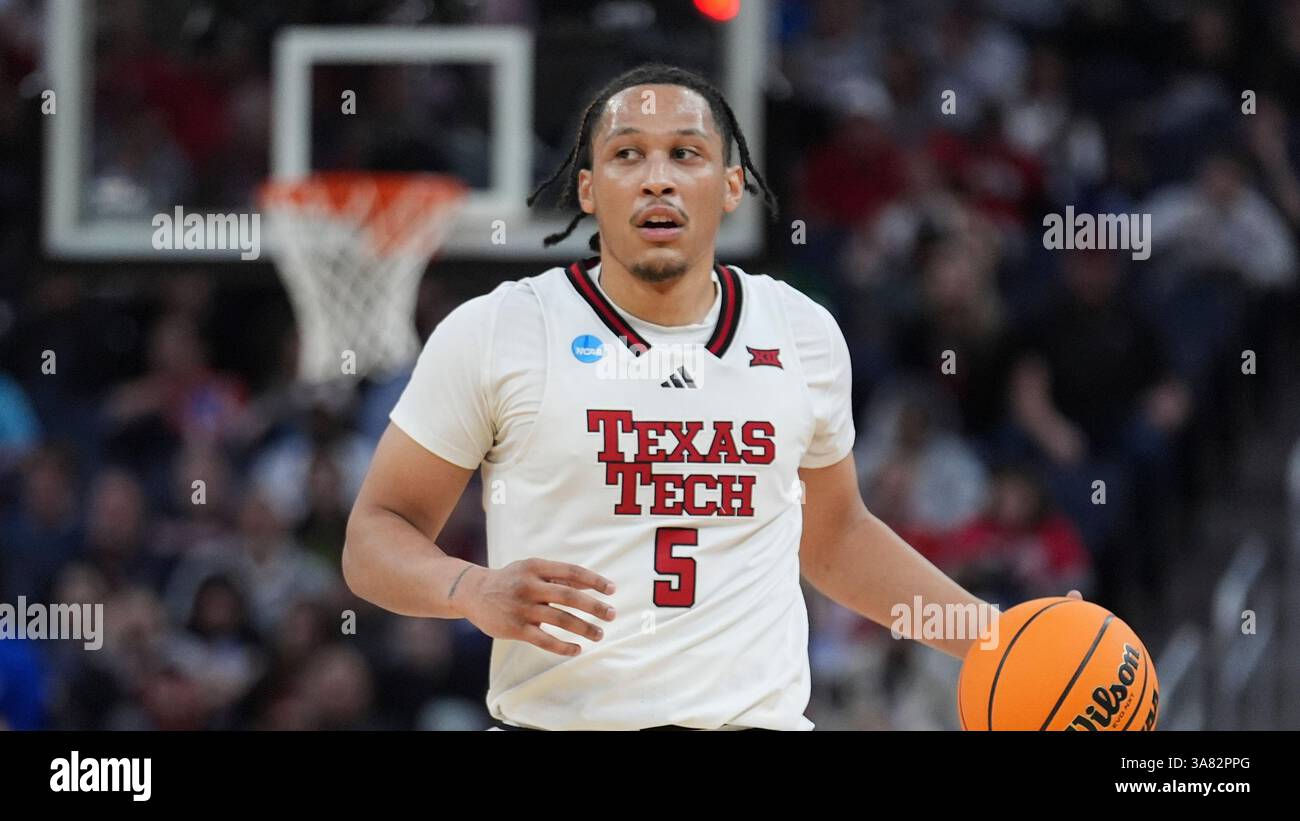 Texas Tech forward Darrion Williams controls the ball during the first ...