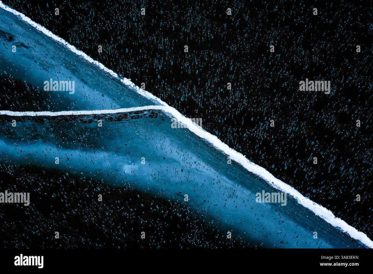 Ice shapes under a frozen lake surface in winter Stock Photo - Alamy