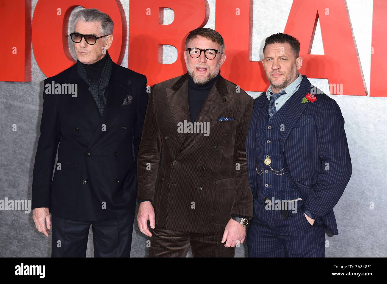 Guy Ritchie Paramount Pierce Brosnan, Guy Ritchie und Tom Hardy bei der Premiere der ...