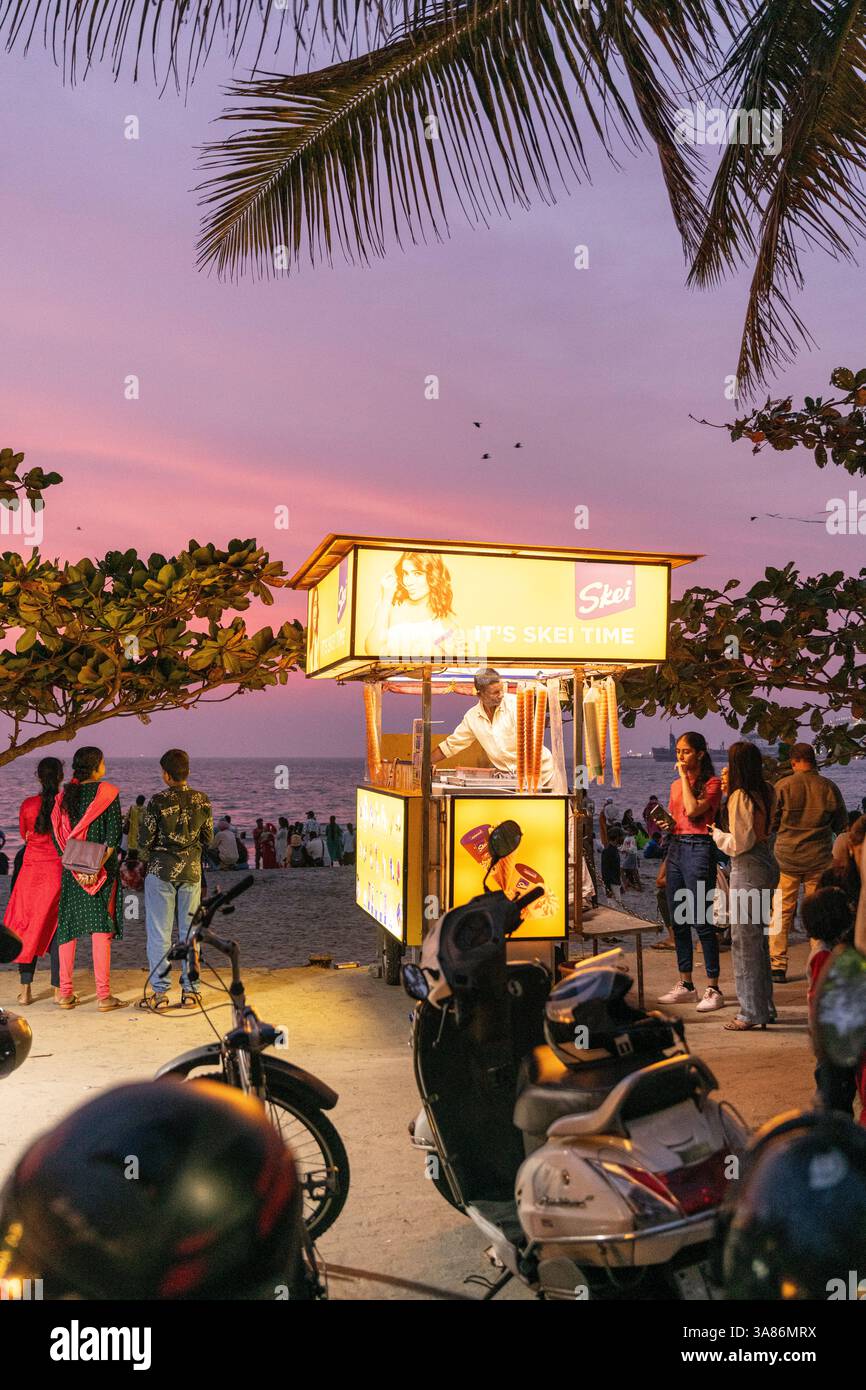 Ice cream vendor on the beach at sunset, Fort Kochi, Kerala, India Stock Photo