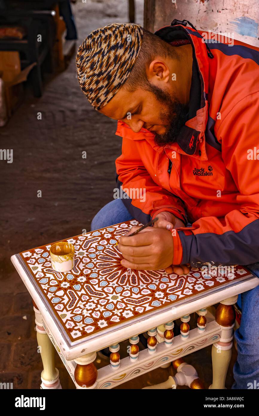 Craftsman at work in an inlay workshop in Marrakesh, Morocco Stock Photo