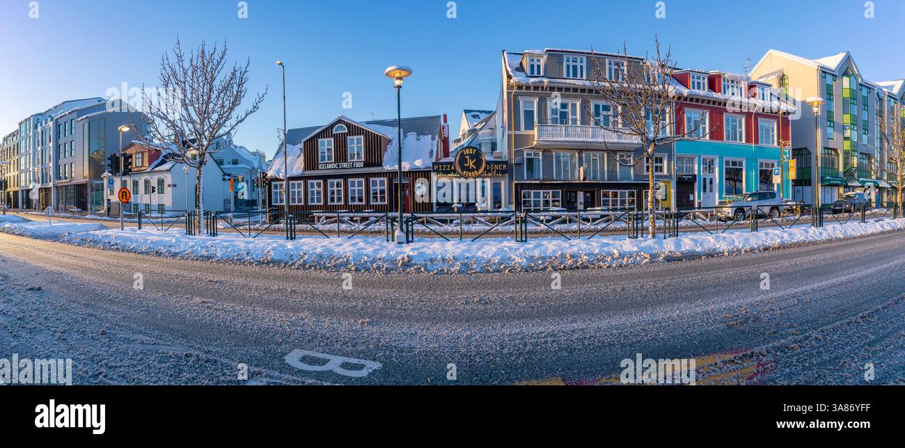 View of colourful cafes and restaurants in the city centre of Reykjavik in winter, Reykjavik, Iceland Stock Photo