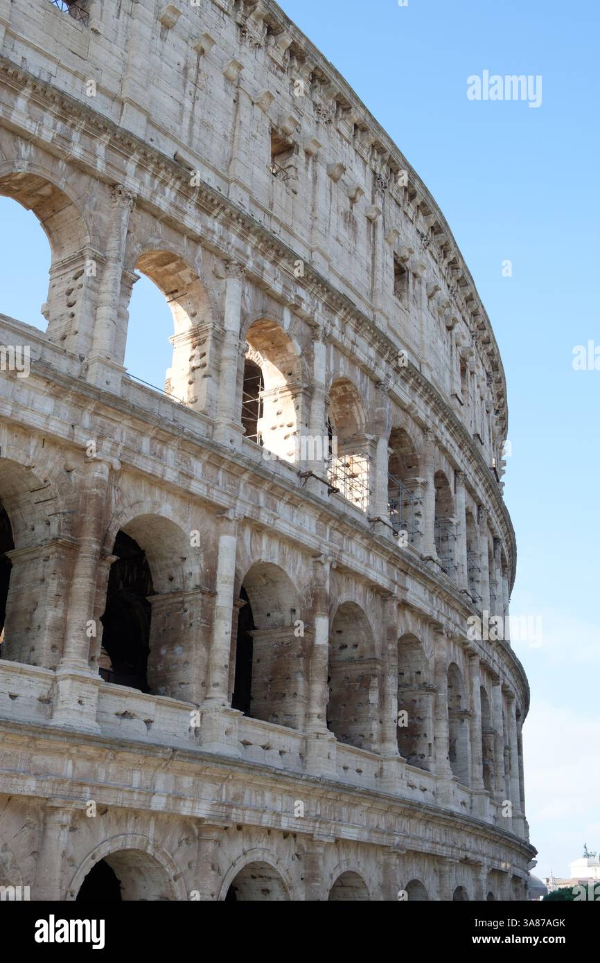 A view of the exterior arches of the ancient Roman Colosseum in Rome ...