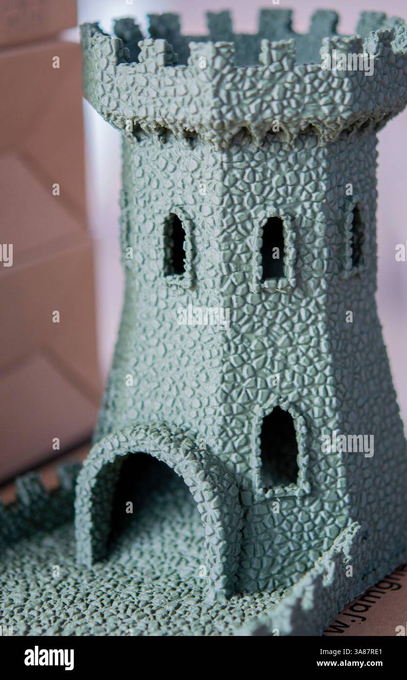 Small object created from molten plastic on 3D printer. Three-dimensional model printed on 3D printer from plastic. Modern new 3d printing technology. FDM technology. Additive progressive technologies Stock Photo