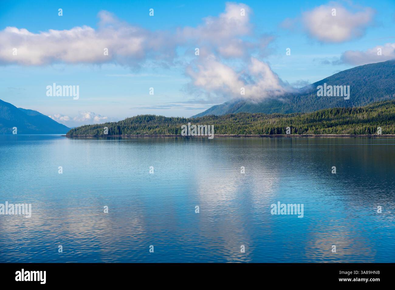 Inside Passage cruise morning mist landscape between Prince Rupert and Port Hardy, British Columbia, Canada. Stock Photo