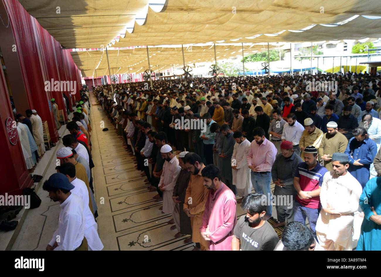 Faithfull Muslims are performing last Friday Prayer of the Holy Month ...