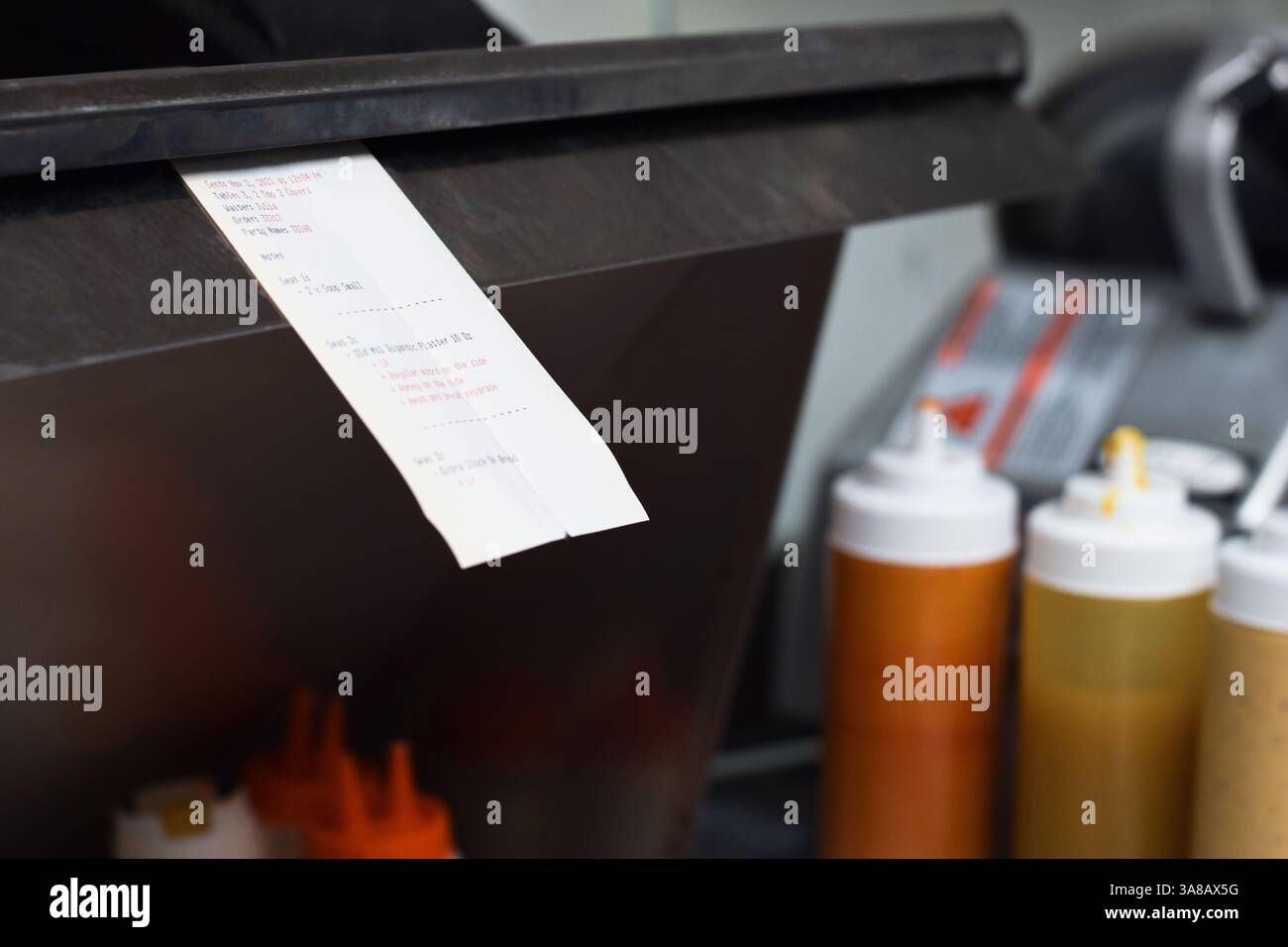 Food order chit in restaurant kitchen Stock Photo