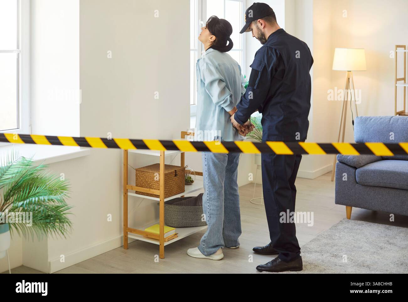 Policeman Arresting Woman Suspect With Handcuffs Stock Photo - Alamy