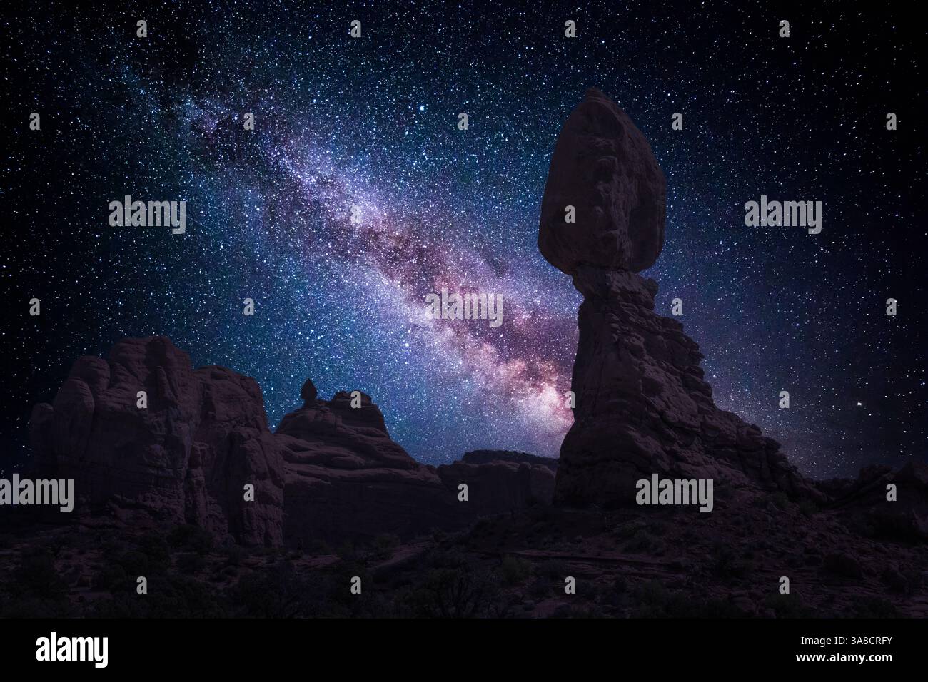 Rock formation at night with starry sky and milky way hi-res stock ...