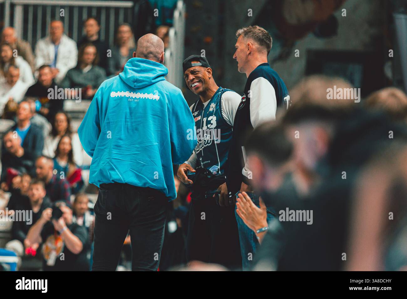 Jerome Williams (in the middle) Maciej Lampe (left) and Cezary Trybański during the game beetween Dziki Warszawa - Sląsk Wrocław Stock Photo