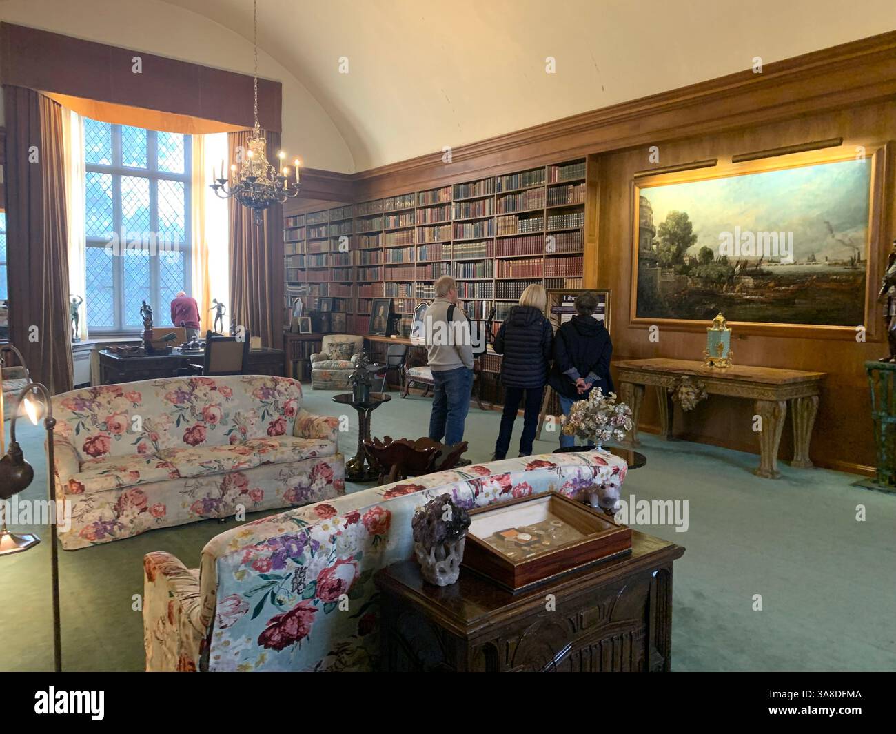 Anglesey Abbey Cambridgeshire UK England hall library  stand pictures carpets carpet decorations library Mary Queen of Scots Henry the eighth - Smartphone Captured Stock Image