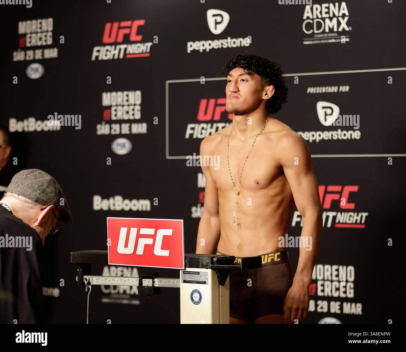 Mexico City, Mexico, MEX. 28th Mar, 2025. poses on the scale during official weigh-ins for UFC Fight Night Mexico City at the InternContinental Mexico City hotel in Mexico City, MX. (Credit Image: © Alejandro Salazar/ZUMA Press Wire) EDITORIAL USAGE ONLY! Not for Commercial USAGE! Stock Photo