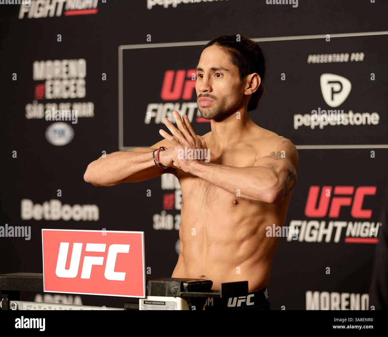 Mexico City, Mexico, MEX. 28th Mar, 2025. poses on the scale during official weigh-ins for UFC Fight Night Mexico City at the InternContinental Mexico City hotel in Mexico City, MX. (Credit Image: © Alejandro Salazar/ZUMA Press Wire) EDITORIAL USAGE ONLY! Not for Commercial USAGE! Stock Photo