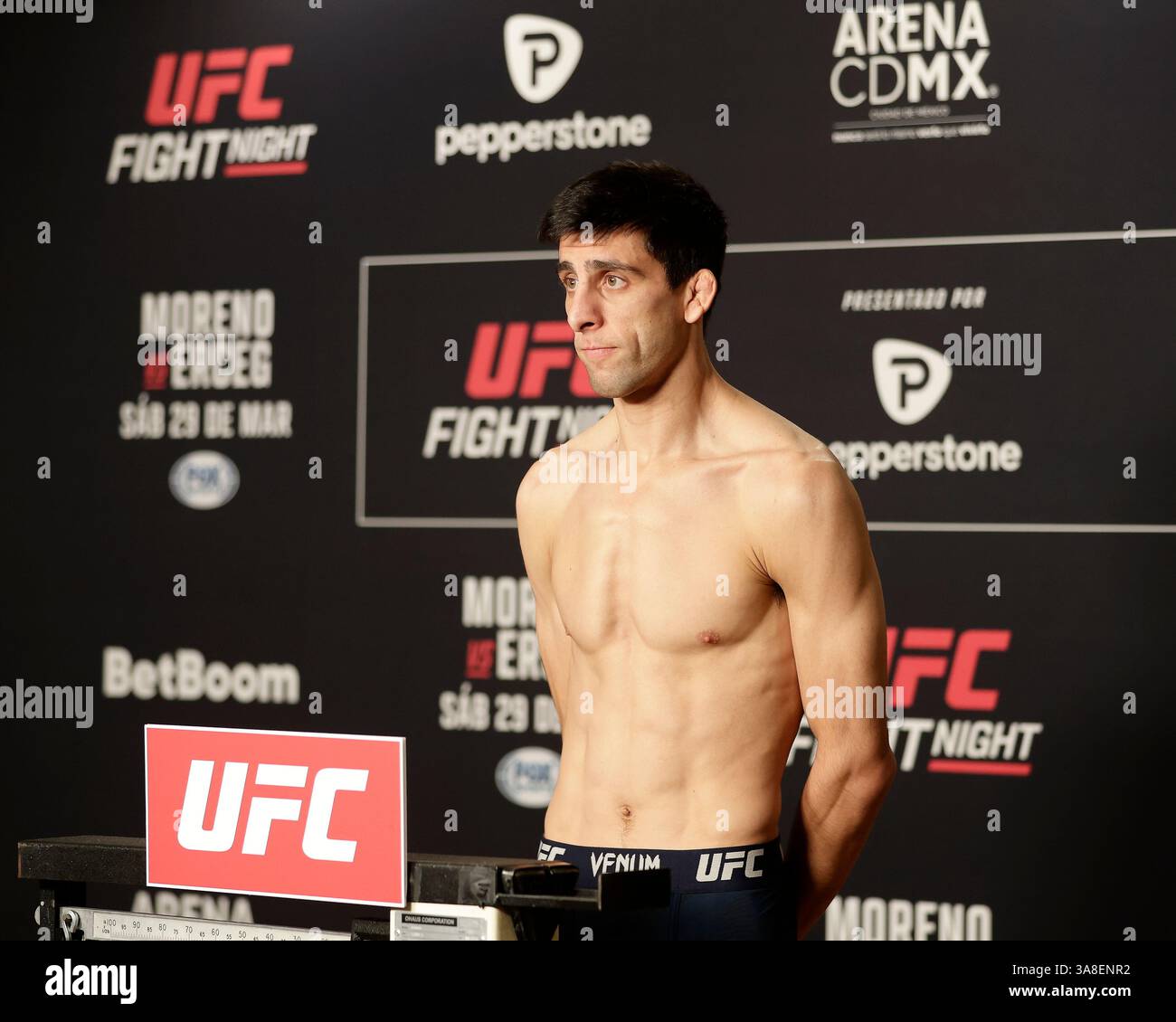Mexico City, Mexico, MEX. 28th Mar, 2025. poses on the scale during official weigh-ins for UFC Fight Night Mexico City at the InternContinental Mexico City hotel in Mexico City, MX. (Credit Image: © Alejandro Salazar/ZUMA Press Wire) EDITORIAL USAGE ONLY! Not for Commercial USAGE! Stock Photo