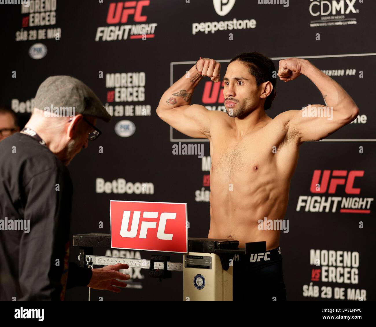 Mexico City, Mexico, MEX. 28th Mar, 2025. poses on the scale during official weigh-ins for UFC Fight Night Mexico City at the InternContinental Mexico City hotel in Mexico City, MX. (Credit Image: © Alejandro Salazar/ZUMA Press Wire) EDITORIAL USAGE ONLY! Not for Commercial USAGE! Stock Photo