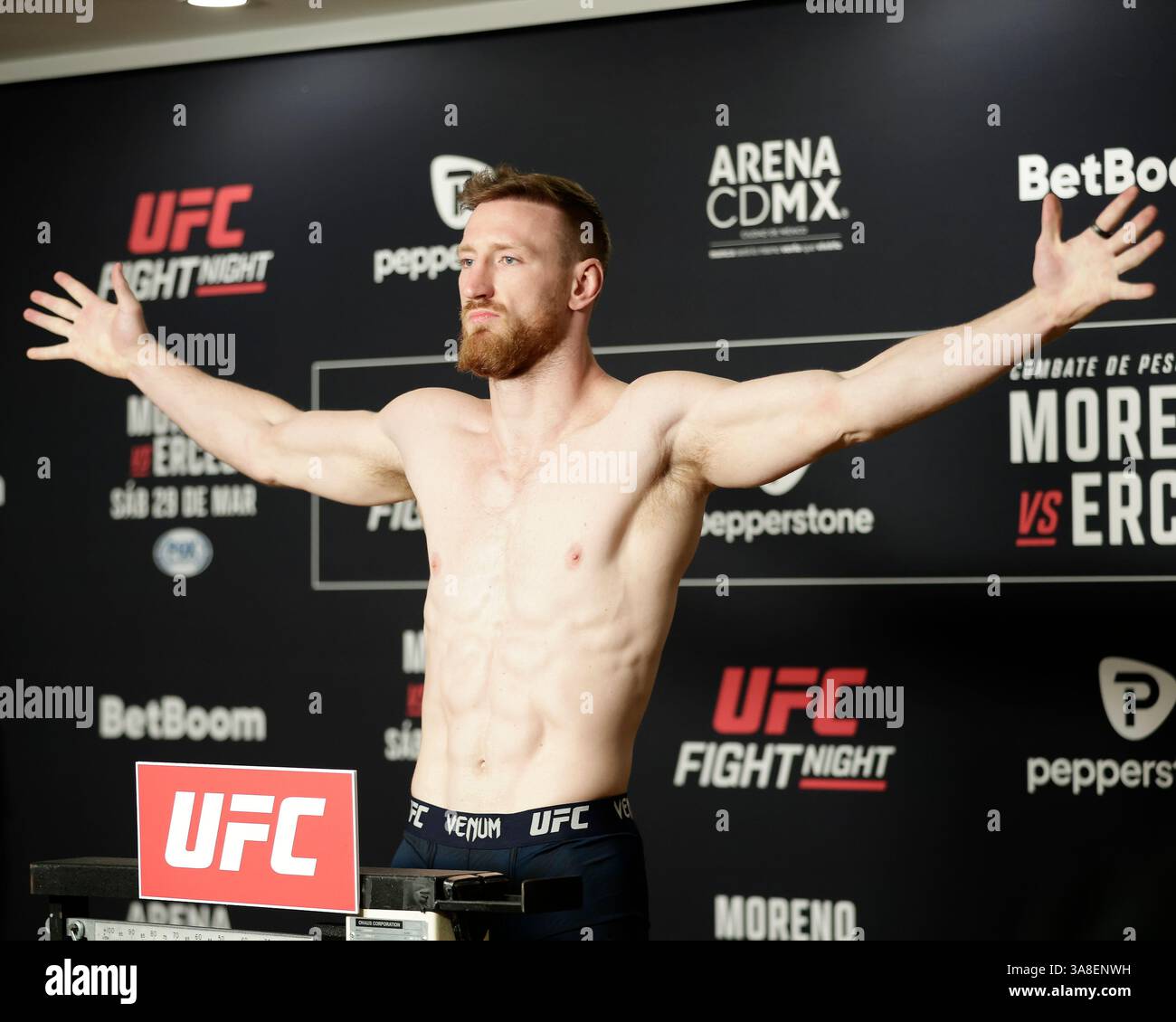 Mexico City, Mexico, MEX. 28th Mar, 2025. poses on the scale during official weigh-ins for UFC Fight Night Mexico City at the InternContinental Mexico City hotel in Mexico City, MX. (Credit Image: © Alejandro Salazar/ZUMA Press Wire) EDITORIAL USAGE ONLY! Not for Commercial USAGE! Stock Photo