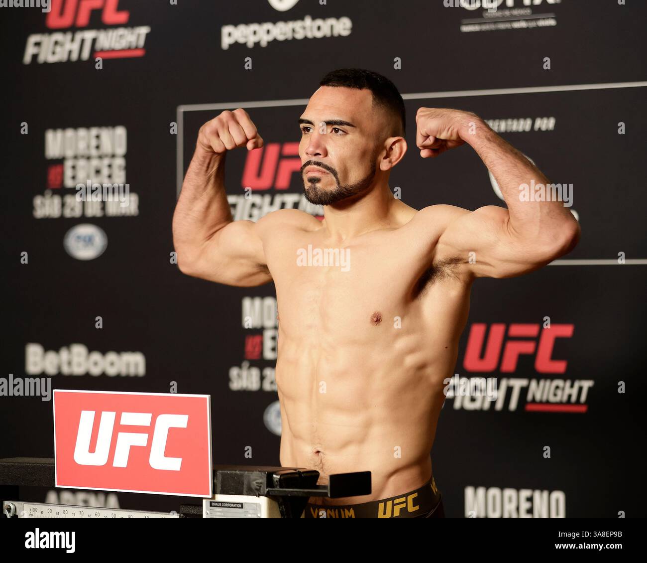 Mexico City, Mexico, MEX. 28th Mar, 2025. poses on the scale during official weigh-ins for UFC Fight Night Mexico City at the InternContinental Mexico City hotel in Mexico City, MX. (Credit Image: © Alejandro Salazar/ZUMA Press Wire) EDITORIAL USAGE ONLY! Not for Commercial USAGE! Stock Photo