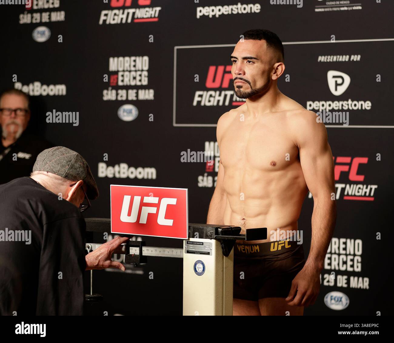 Mexico City, Mexico, MEX. 28th Mar, 2025. poses on the scale during official weigh-ins for UFC Fight Night Mexico City at the InternContinental Mexico City hotel in Mexico City, MX. (Credit Image: © Alejandro Salazar/ZUMA Press Wire) EDITORIAL USAGE ONLY! Not for Commercial USAGE! Stock Photo
