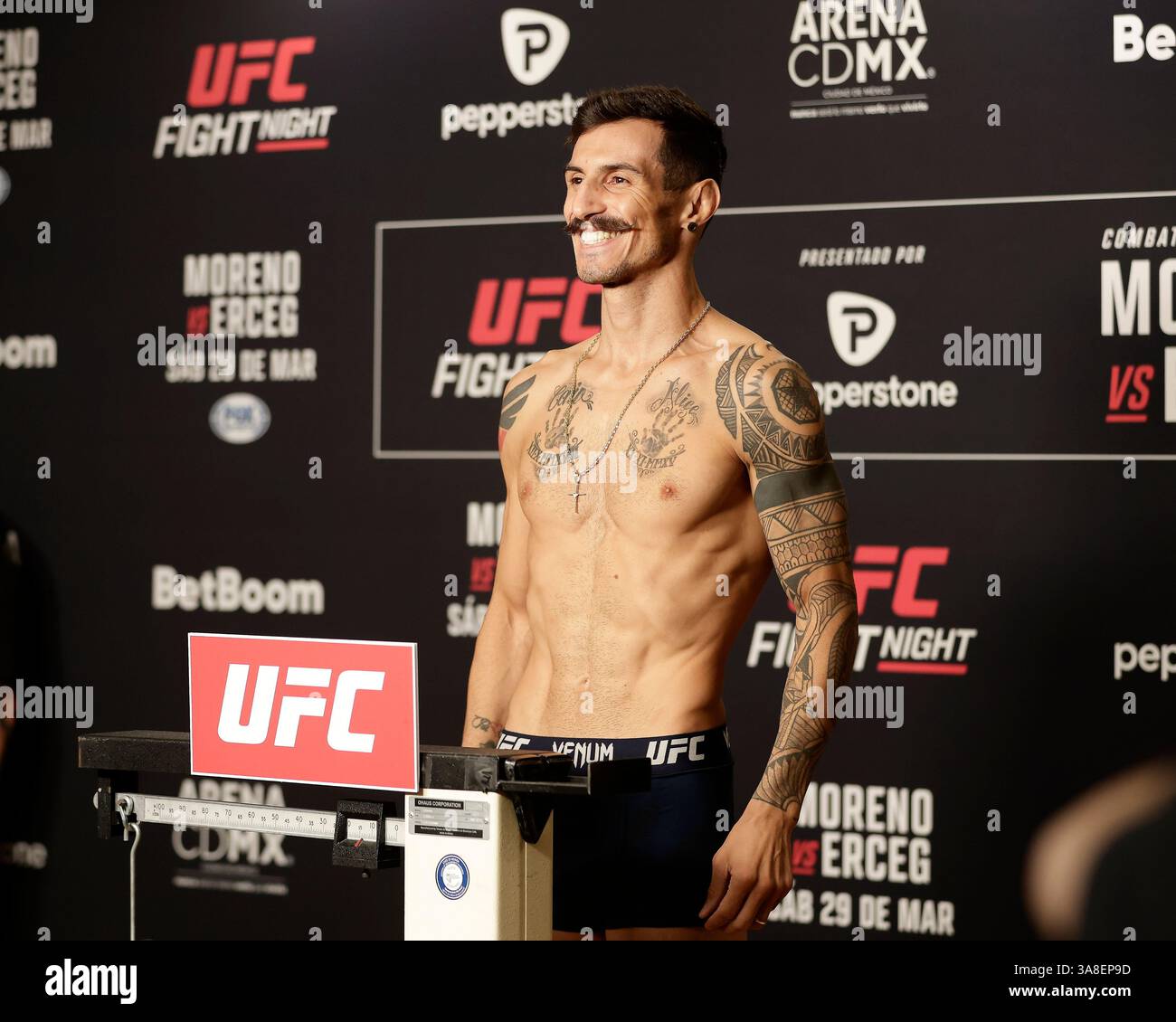 Mexico City, Mexico, MEX. 28th Mar, 2025. poses on the scale during official weigh-ins for UFC Fight Night Mexico City at the InternContinental Mexico City hotel in Mexico City, MX. (Credit Image: © Alejandro Salazar/ZUMA Press Wire) EDITORIAL USAGE ONLY! Not for Commercial USAGE! Stock Photo