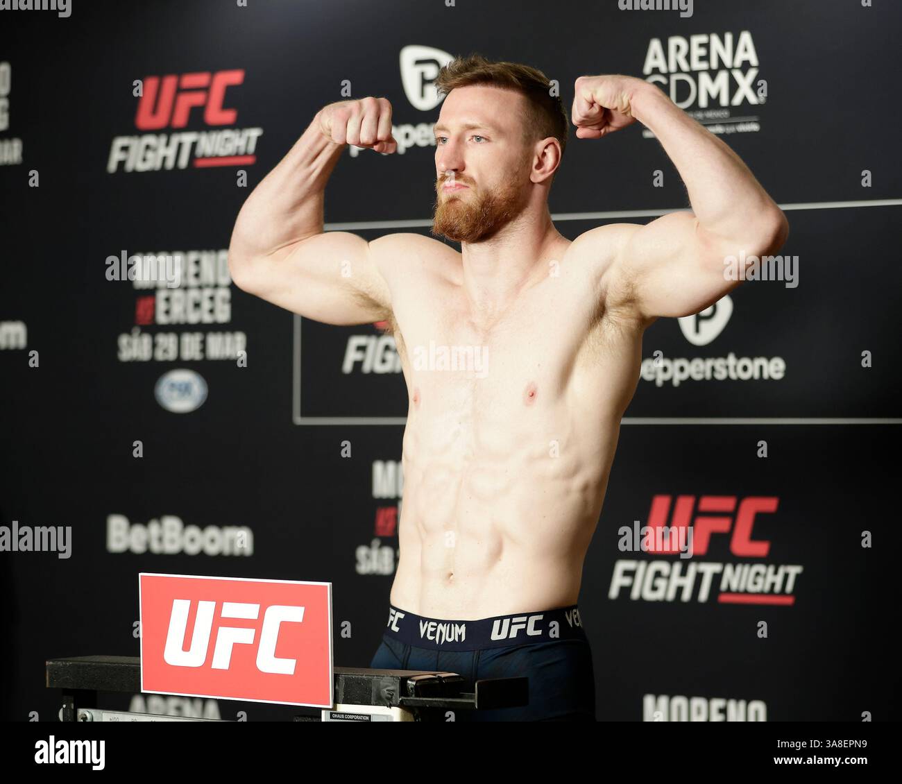 Mexico City, Mexico, MEX. 28th Mar, 2025. poses on the scale during official weigh-ins for UFC Fight Night Mexico City at the InternContinental Mexico City hotel in Mexico City, MX. (Credit Image: © Alejandro Salazar/ZUMA Press Wire) EDITORIAL USAGE ONLY! Not for Commercial USAGE! Stock Photo