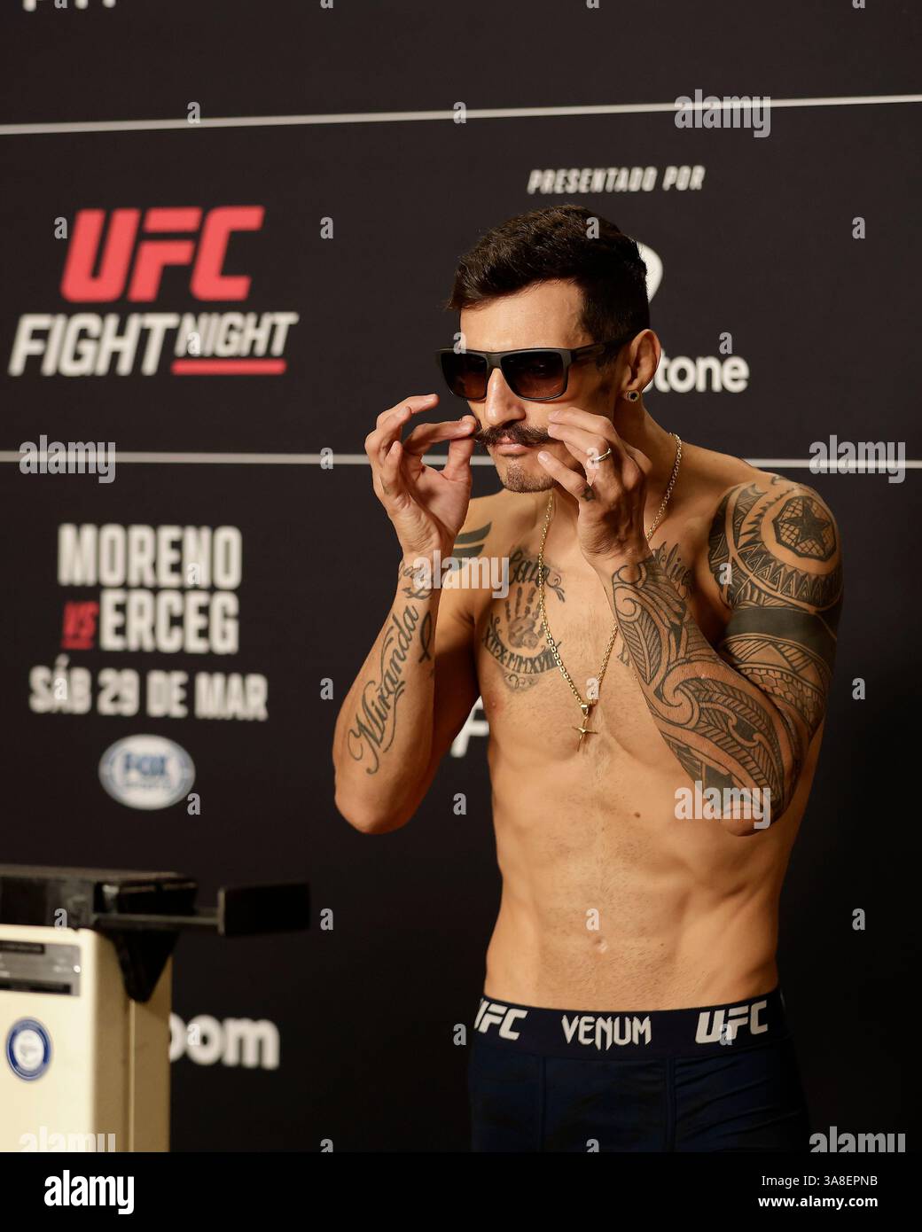 Mexico City, Mexico, MEX. 28th Mar, 2025. poses on the scale during official weigh-ins for UFC Fight Night Mexico City at the InternContinental Mexico City hotel in Mexico City, MX. (Credit Image: © Alejandro Salazar/ZUMA Press Wire) EDITORIAL USAGE ONLY! Not for Commercial USAGE! Stock Photo