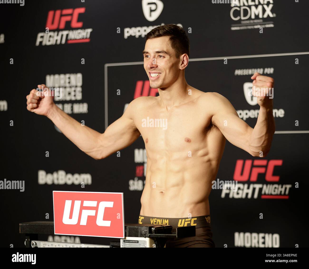 Mexico City, Mexico, MEX. 28th Mar, 2025. poses on the scale during official weigh-ins for UFC Fight Night Mexico City at the InternContinental Mexico City hotel in Mexico City, MX. (Credit Image: © Alejandro Salazar/ZUMA Press Wire) EDITORIAL USAGE ONLY! Not for Commercial USAGE! Stock Photo