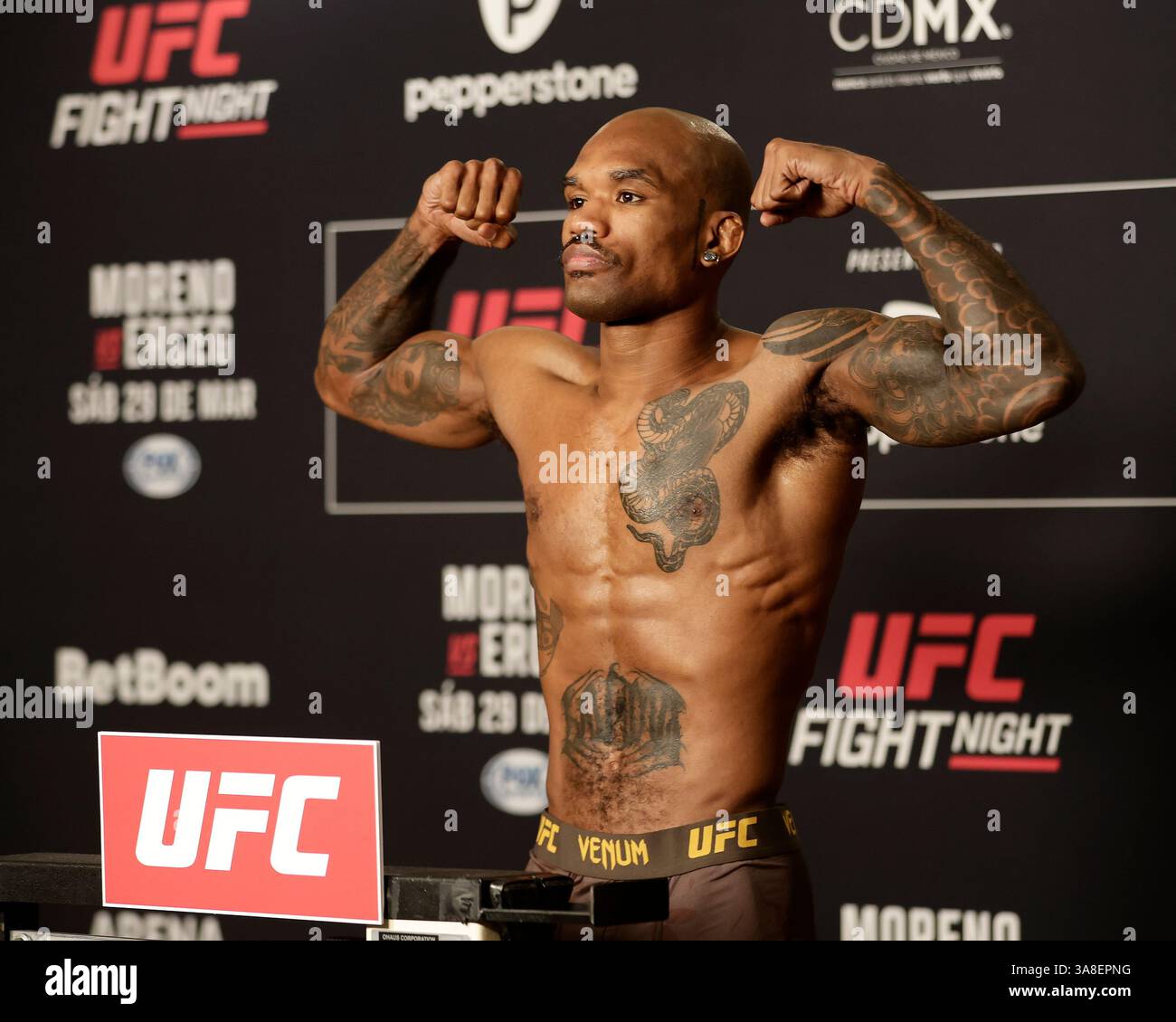 Mexico City, Mexico, MEX. 28th Mar, 2025. poses on the scale during official weigh-ins for UFC Fight Night Mexico City at the InternContinental Mexico City hotel in Mexico City, MX. (Credit Image: © Alejandro Salazar/ZUMA Press Wire) EDITORIAL USAGE ONLY! Not for Commercial USAGE! Stock Photo