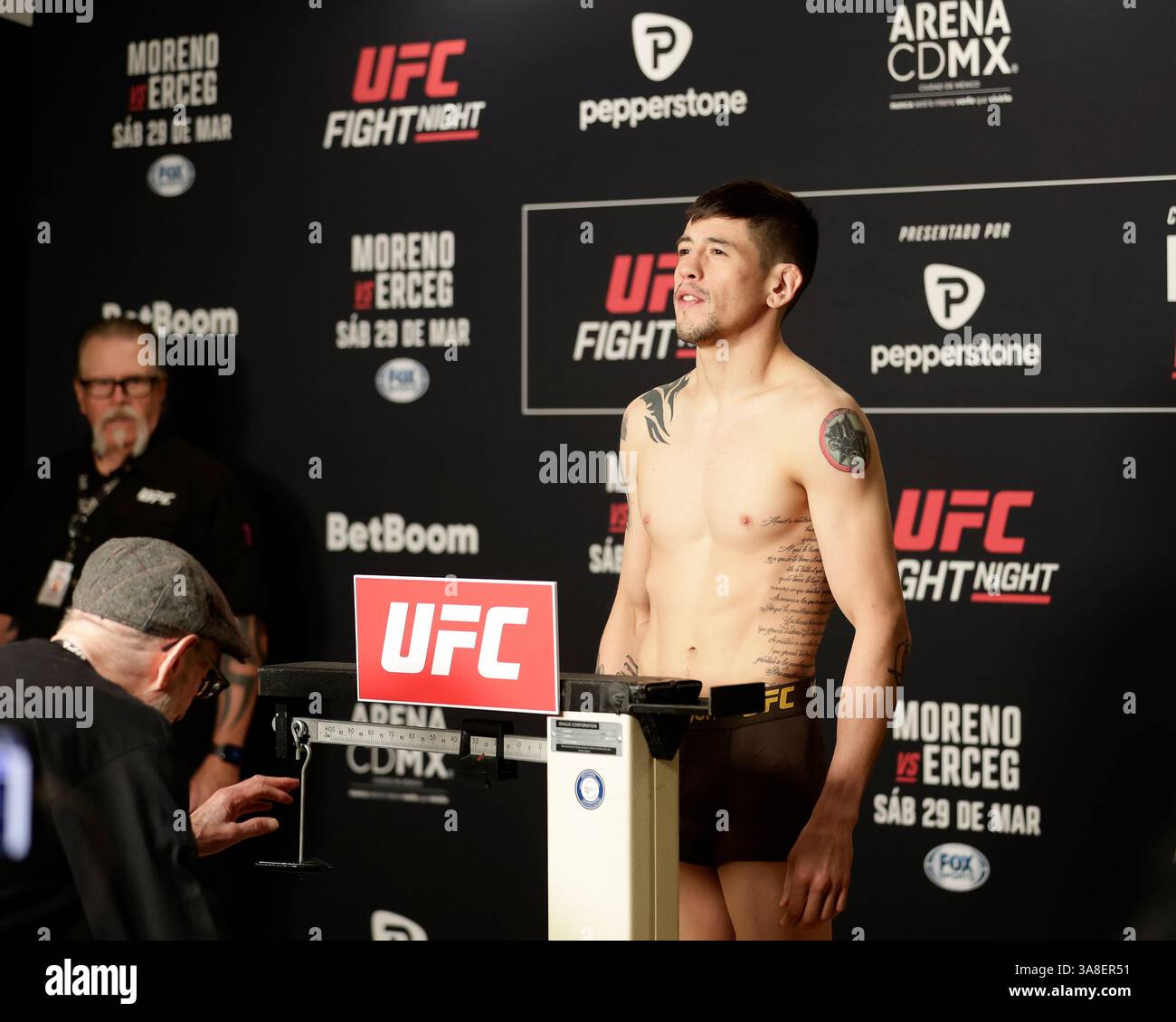 Mexico City, Mexico, MEX. 28th Mar, 2025. poses on the scale during official weigh-ins for UFC Fight Night Mexico City at the InternContinental Mexico City hotel in Mexico City, MX. (Credit Image: © Alejandro Salazar/ZUMA Press Wire) EDITORIAL USAGE ONLY! Not for Commercial USAGE! Stock Photo