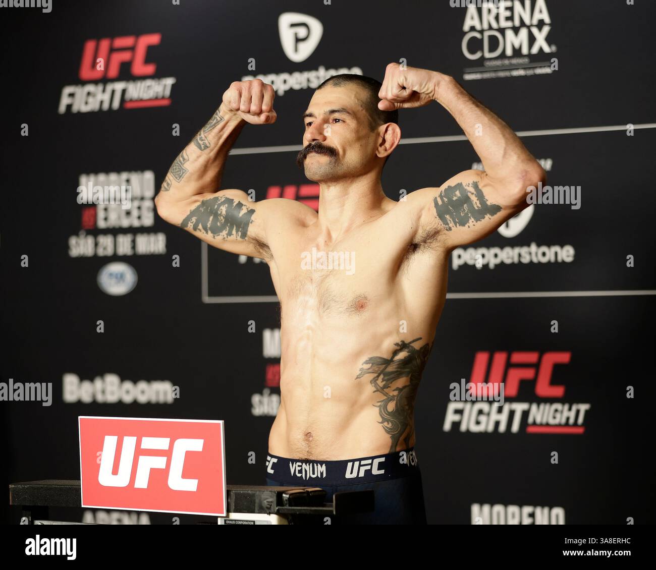Mexico City, Mexico, MEX. 28th Mar, 2025. poses on the scale during official weigh-ins for UFC Fight Night Mexico City at the InternContinental Mexico City hotel in Mexico City, MX. (Credit Image: © Alejandro Salazar/ZUMA Press Wire) EDITORIAL USAGE ONLY! Not for Commercial USAGE! Stock Photo