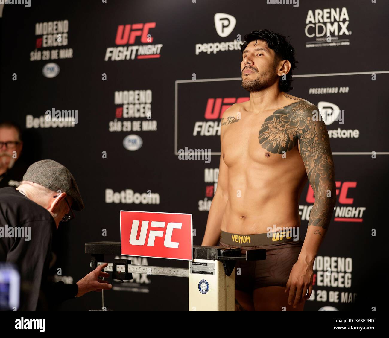 Mexico City, Mexico, MEX. 28th Mar, 2025. poses on the scale during official weigh-ins for UFC Fight Night Mexico City at the InternContinental Mexico City hotel in Mexico City, MX. (Credit Image: © Alejandro Salazar/ZUMA Press Wire) EDITORIAL USAGE ONLY! Not for Commercial USAGE! Stock Photo