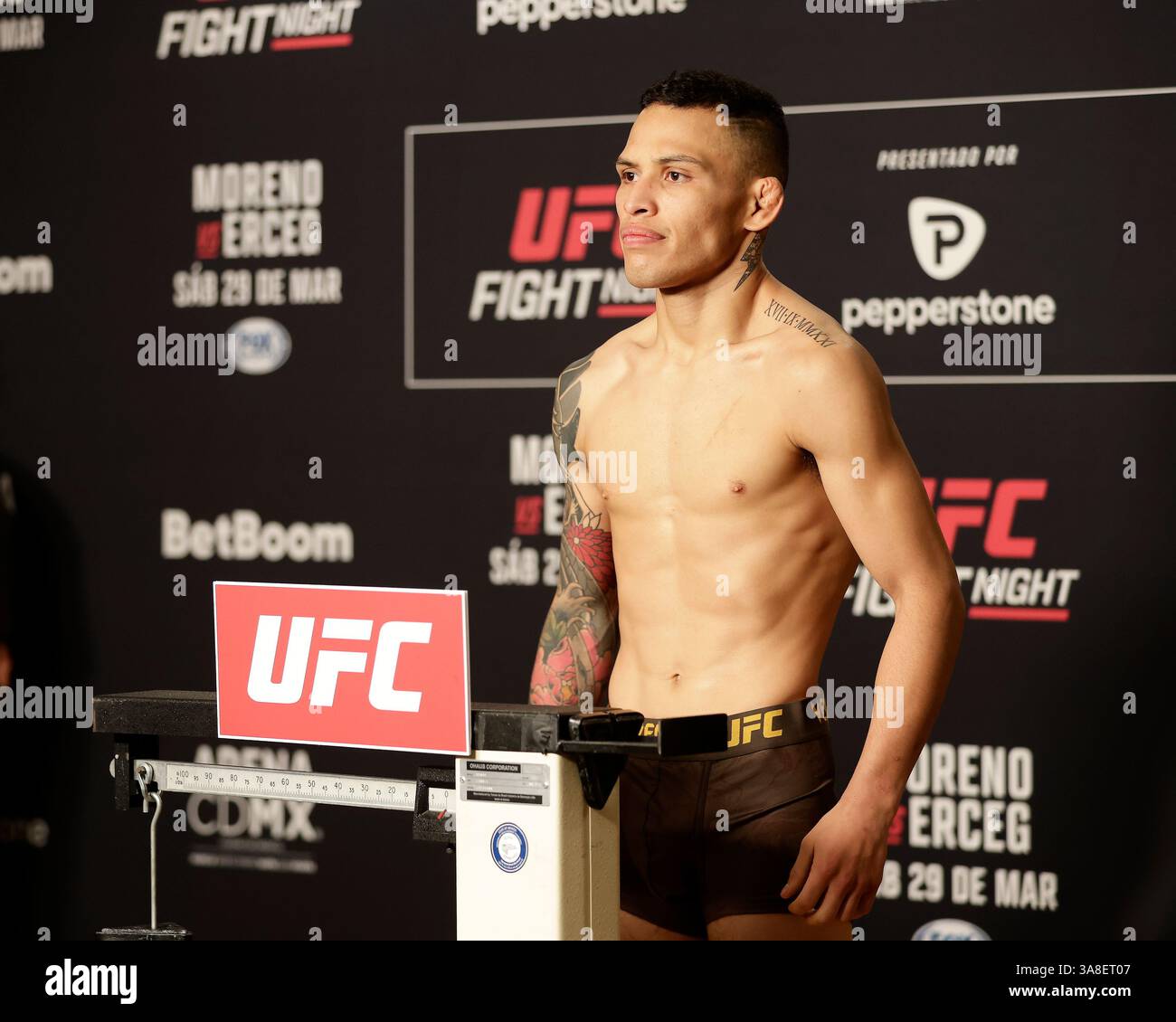 Mexico City, Mexico, MEX. 28th Mar, 2025. poses on the scale during official weigh-ins for UFC Fight Night Mexico City at the InternContinental Mexico City hotel in Mexico City, MX. (Credit Image: © Alejandro Salazar/ZUMA Press Wire) EDITORIAL USAGE ONLY! Not for Commercial USAGE! Stock Photo