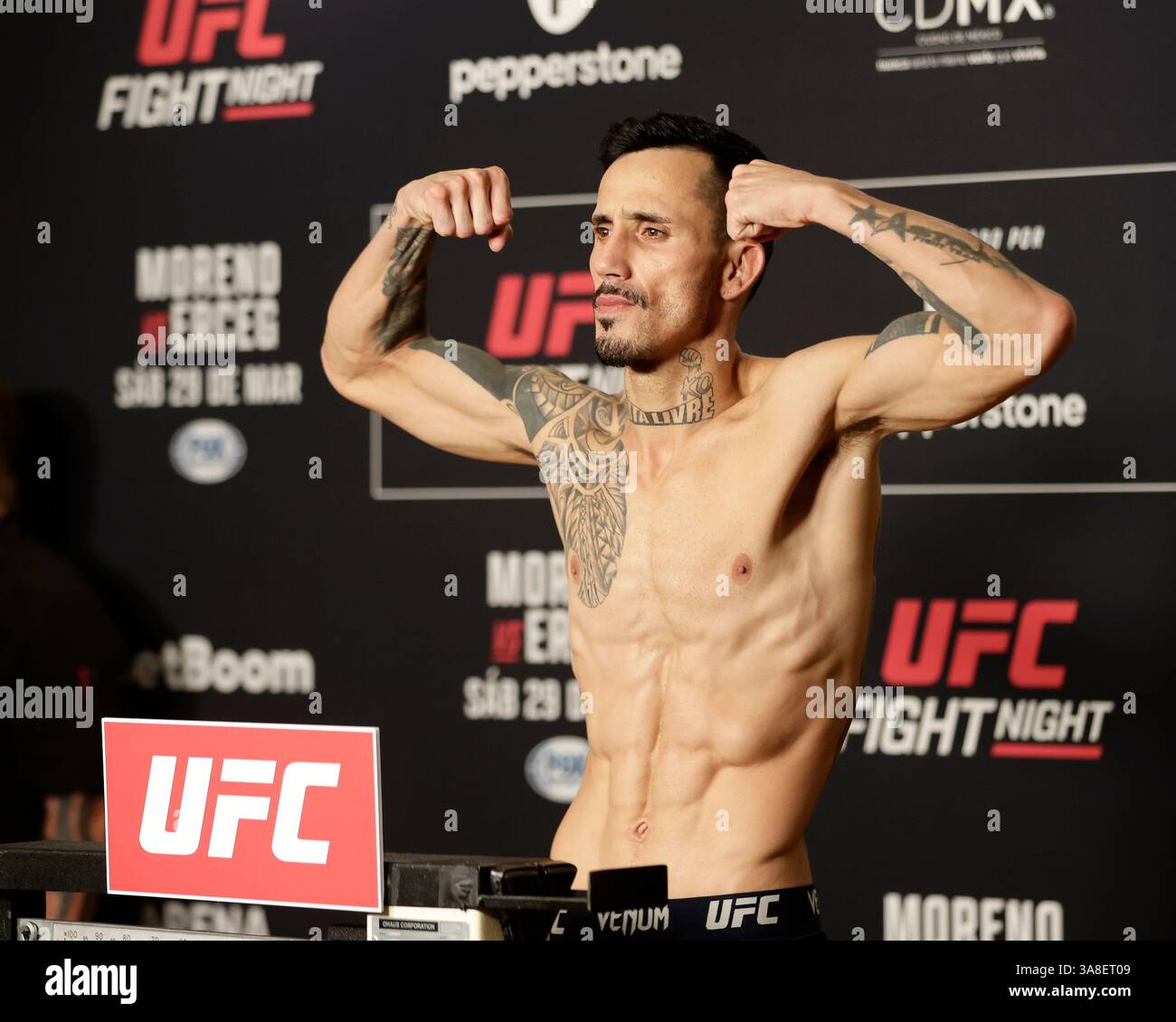 Mexico City, Mexico, MEX. 28th Mar, 2025. poses on the scale during official weigh-ins for UFC Fight Night Mexico City at the InternContinental Mexico City hotel in Mexico City, MX. (Credit Image: © Alejandro Salazar/ZUMA Press Wire) EDITORIAL USAGE ONLY! Not for Commercial USAGE! Stock Photo