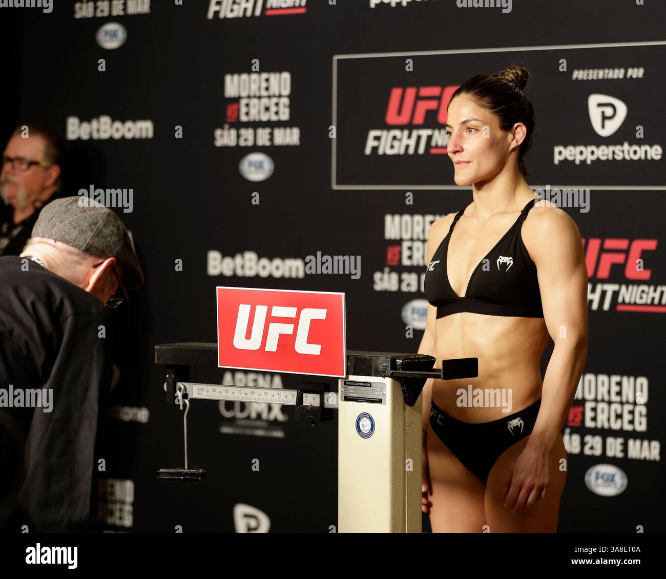 Mexico City, Mexico, MEX. 28th Mar, 2025. poses on the scale during official weigh-ins for UFC Fight Night Mexico City at the InternContinental Mexico City hotel in Mexico City, MX. (Credit Image: © Alejandro Salazar/ZUMA Press Wire) EDITORIAL USAGE ONLY! Not for Commercial USAGE! Stock Photo