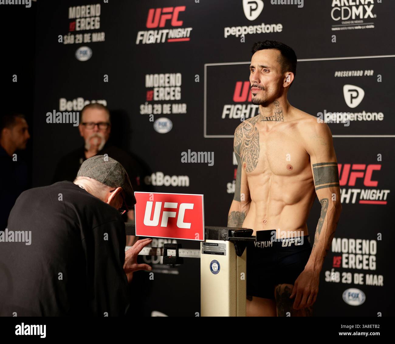 Mexico City, Mexico, MEX. 28th Mar, 2025. poses on the scale during official weigh-ins for UFC Fight Night Mexico City at the InternContinental Mexico City hotel in Mexico City, MX. (Credit Image: © Alejandro Salazar/ZUMA Press Wire) EDITORIAL USAGE ONLY! Not for Commercial USAGE! Stock Photo