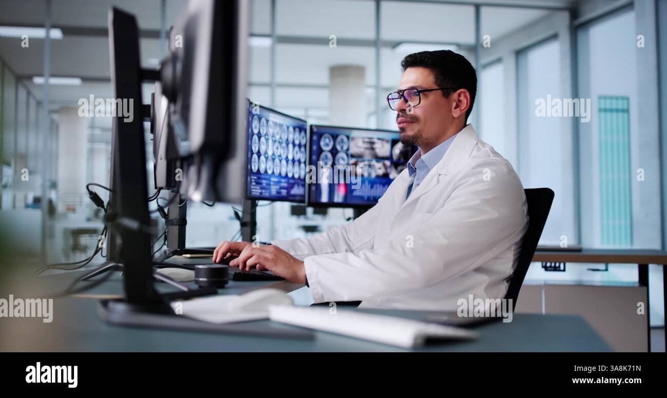 Radiologist Dentist Using X Ray Software On Desktop Computer Stock Photo