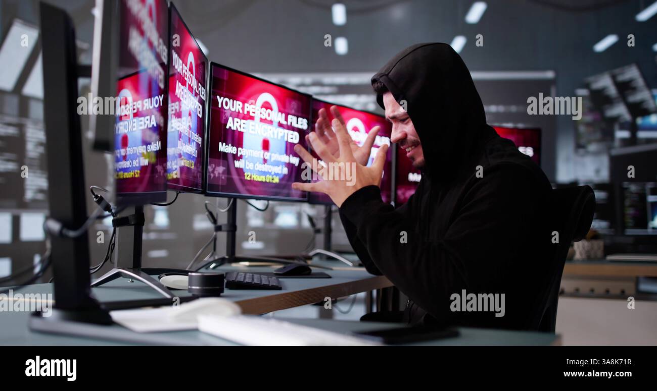 Ransomware Cyber Attack On Hacker Computer. Virus on Screen Stock Photo