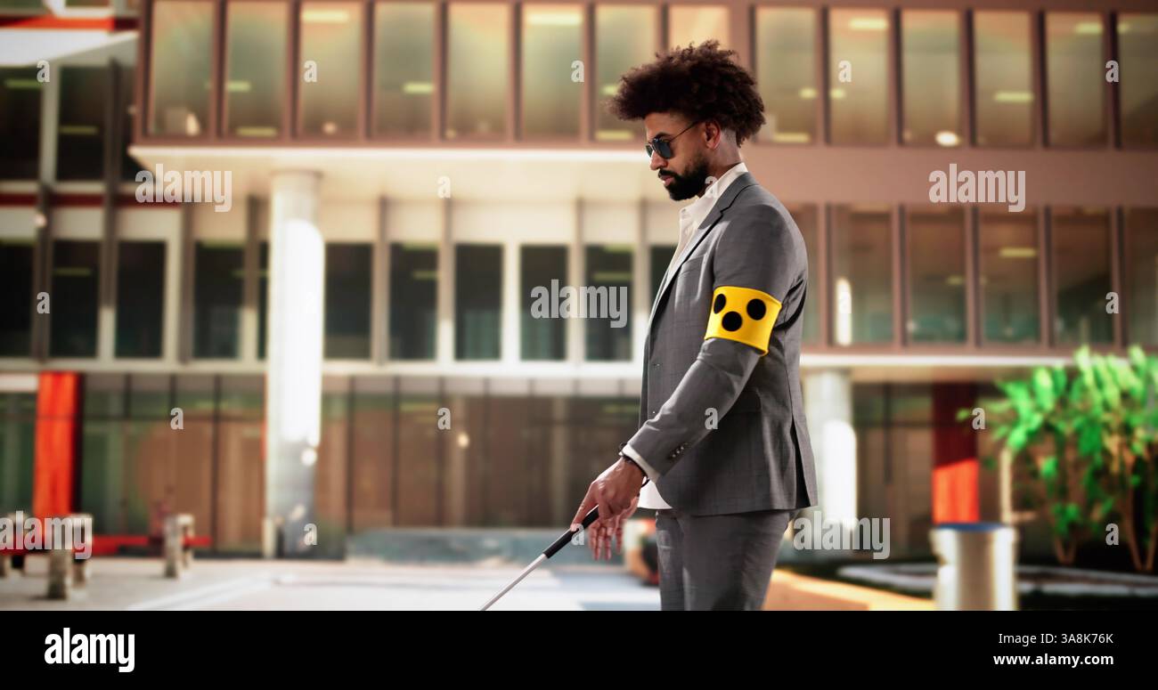 Young blind doctor video chatting while walking on sidewalk with cane. Stock Photo