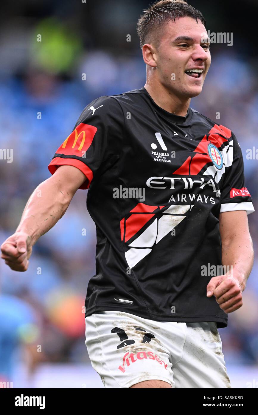 Max Caputo of Melbourne celebrates after scoring a goal during the A ...