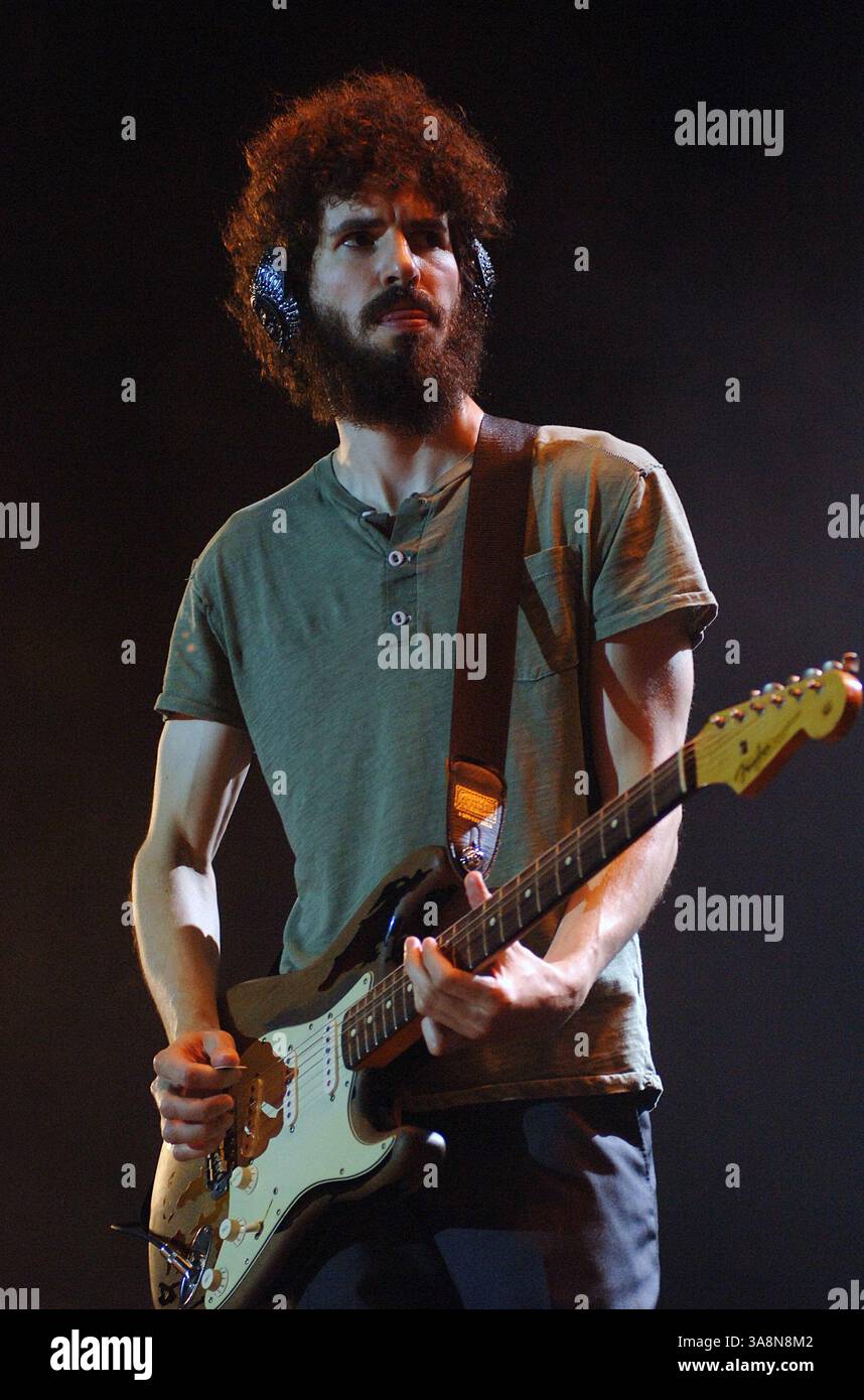Guitarist Brad Delson of the band Linkin Park performs in concert