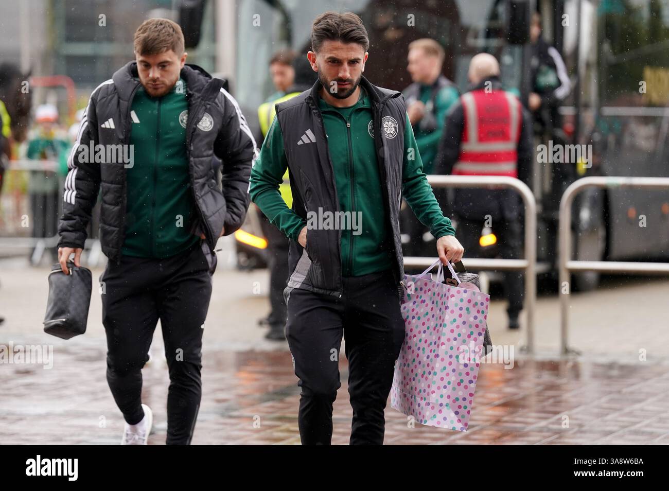 Celtic's Greg Taylor (right) and James Forrest arrive at the ground ...