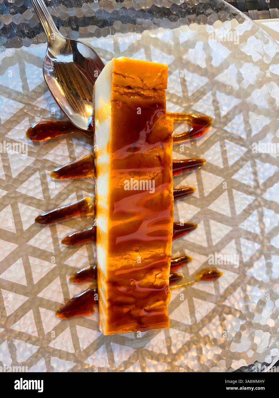 Cheese cake with toffee syrup. - Smartphone Captured Stock Image