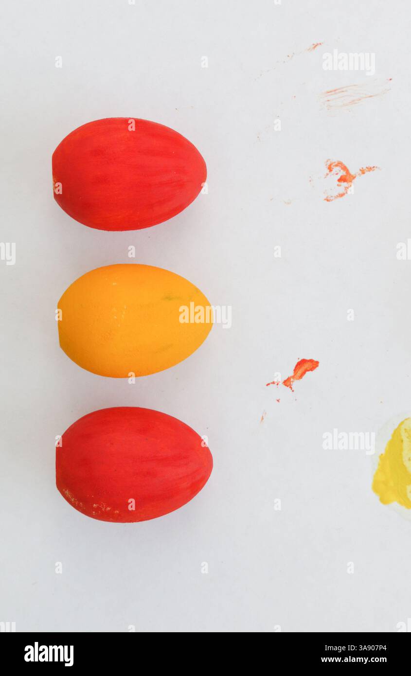 Three freshly painted decorative eggs. Stock Photo