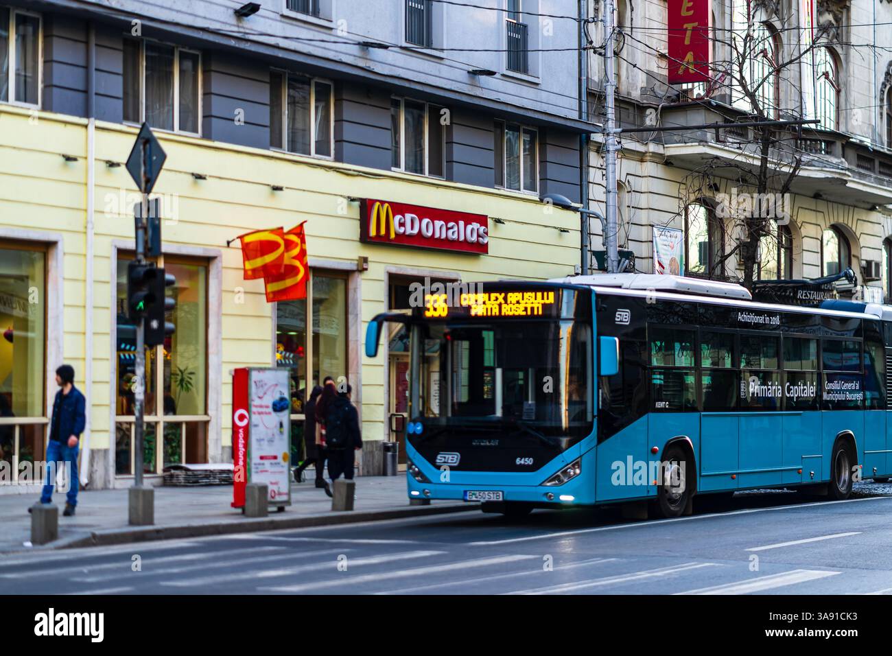 Bucharest Transport Society (STB) trolleybuses and buses in traffic ...