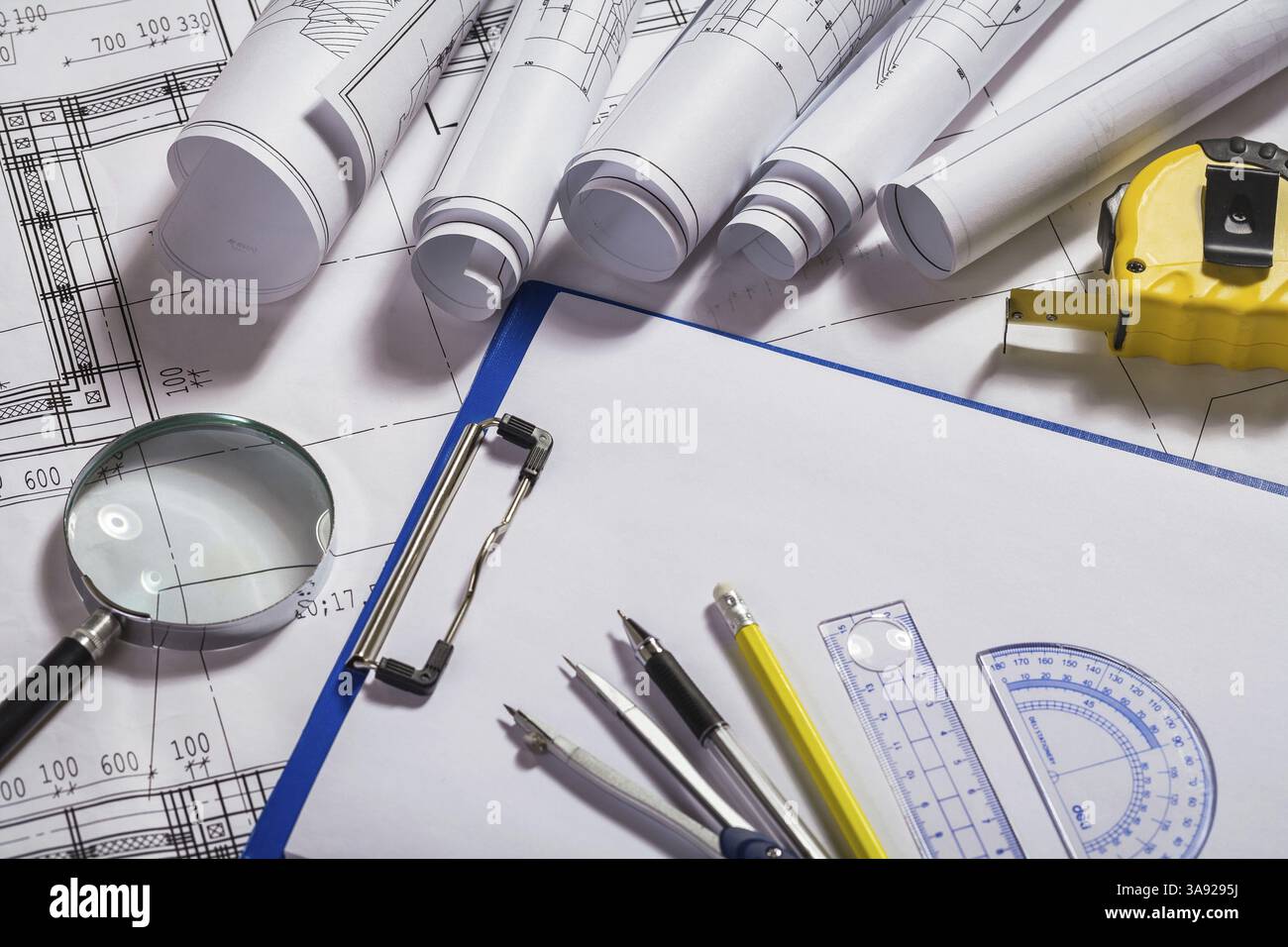 Architect items on blueprints Stock Photo